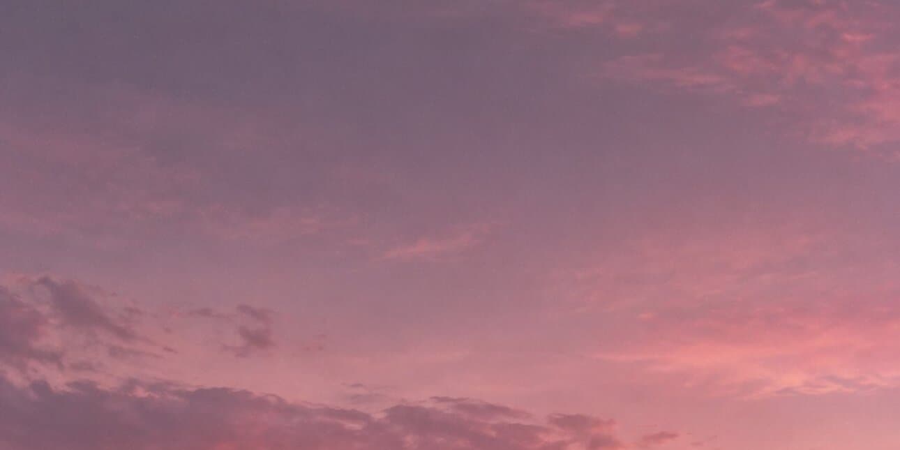 Soft pink clouds at sunrise